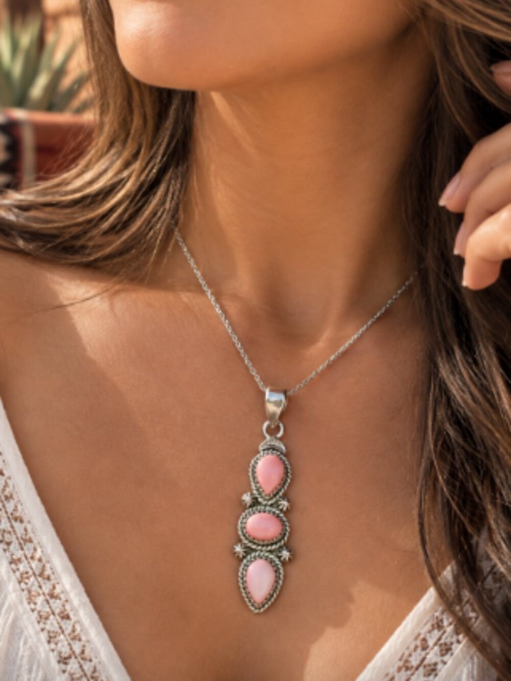 Sterling silver and pink conch shell pendant